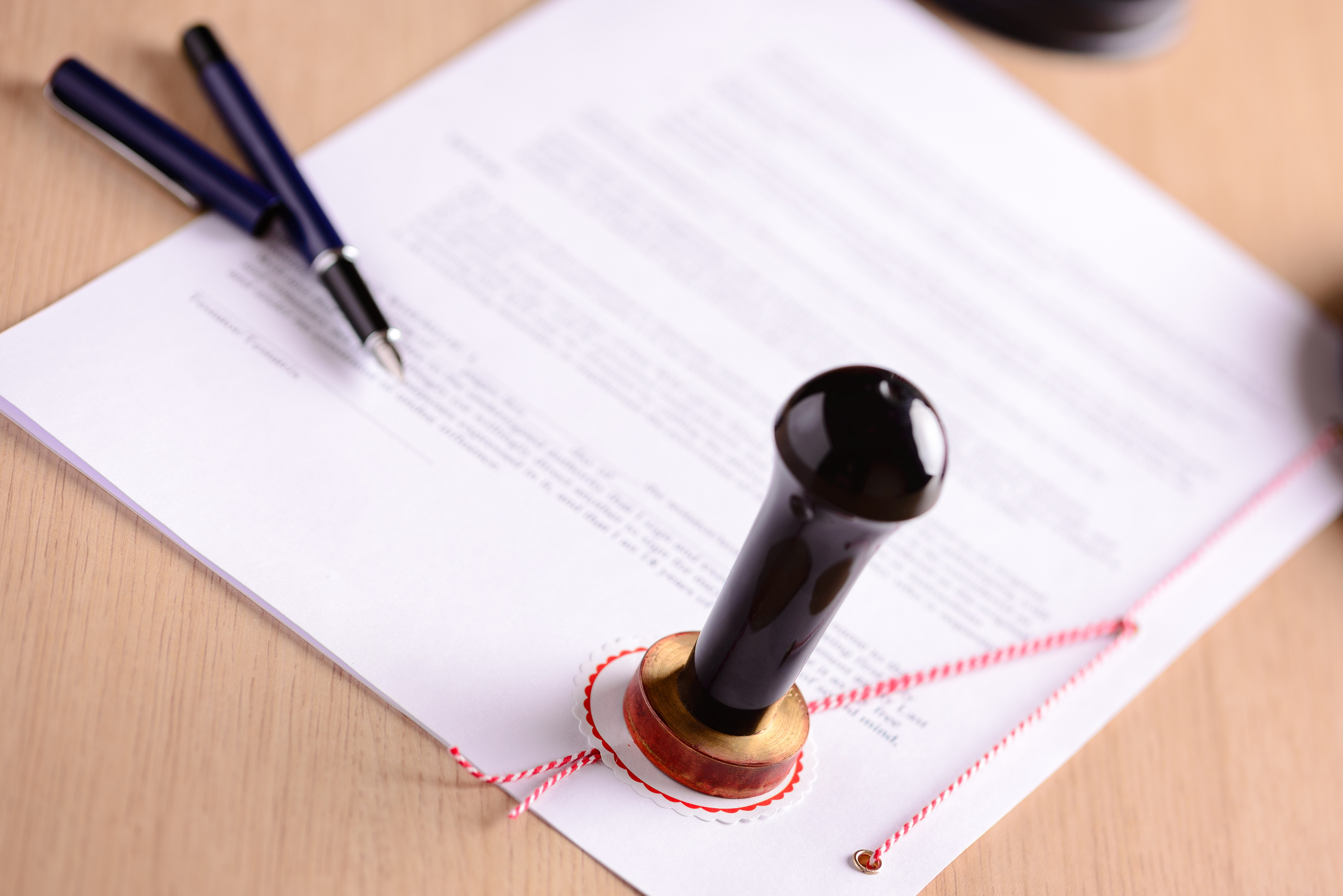 Notary's Public Pen And Stamp On Testament